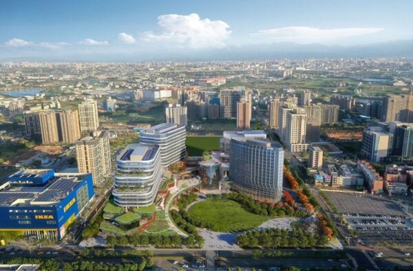 桃園高鐵站前複合開發案完工模擬示意圖，整體建築量體以現代玻璃帷幕與垂直立面設計呈現，結合商辦與公共空間規劃，展現站前門戶新地標意象。（模擬示意圖/中昕金屬股份有限公司）
